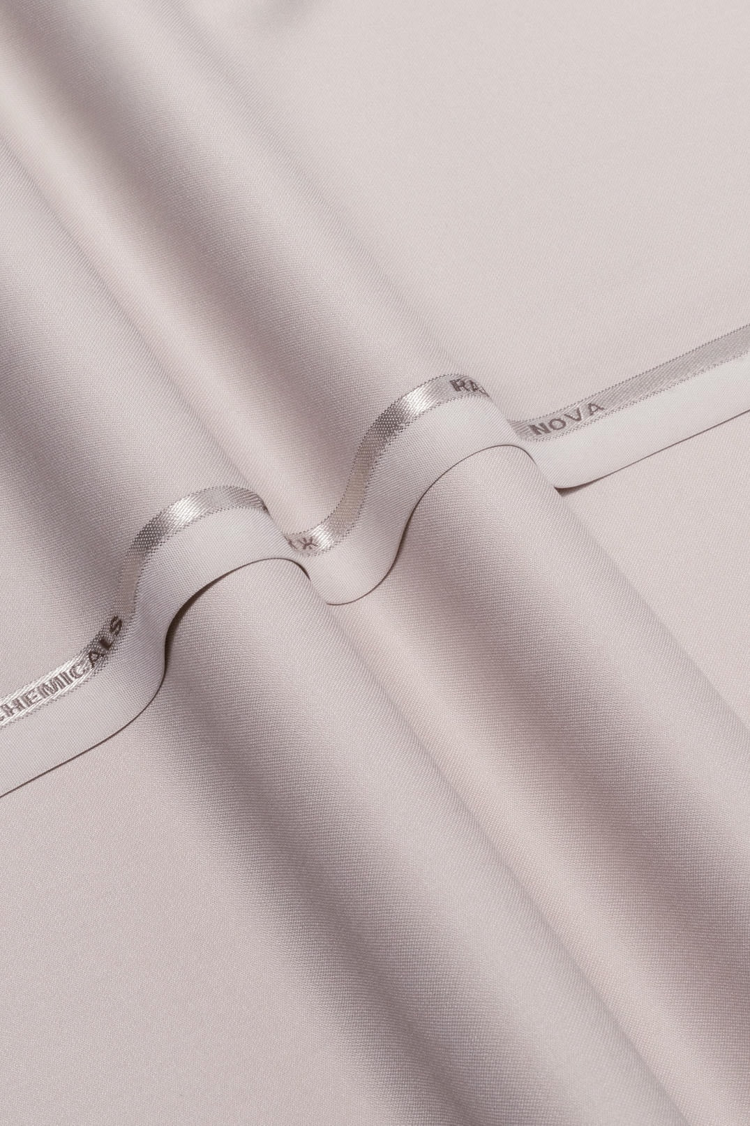 Nova modern sleek versatile everyday essential. Close-up of product's textured surface, 9 of 10.