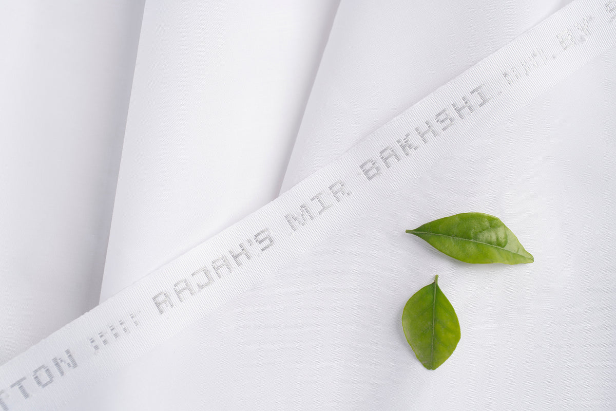 Mir Bakhshi Latha premium fabric, close-up texture, luxurious feel, soft drape. Image 1 of 2.